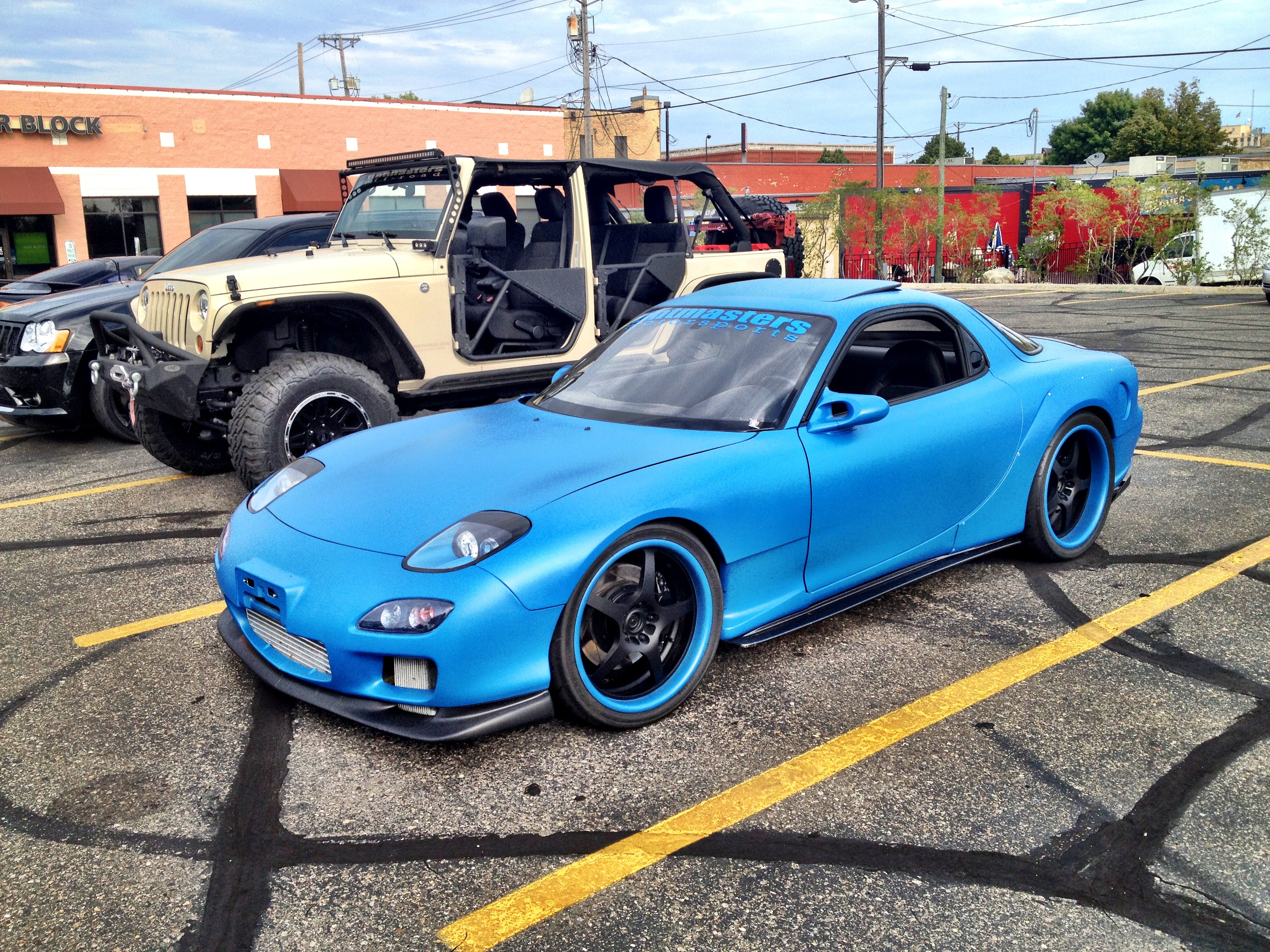Blue Mazda RX-7.